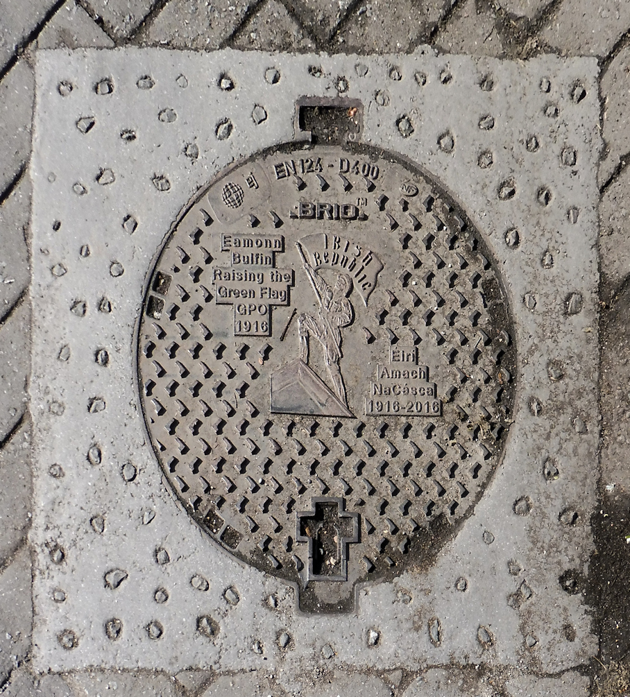 1916 Manhole cover #1525 · Memorial Stone